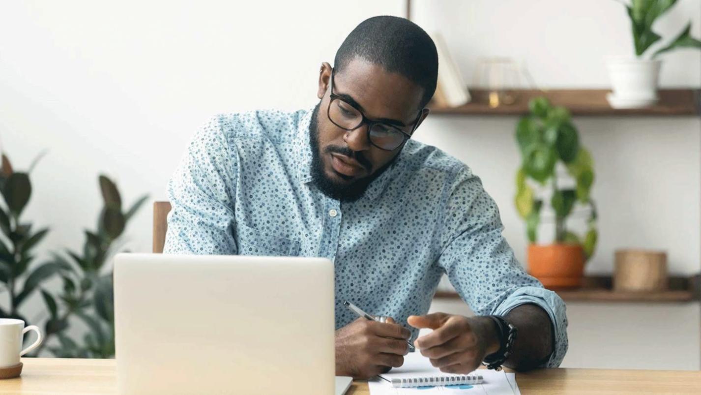 Person using mobile device to check financial dashboard on the go