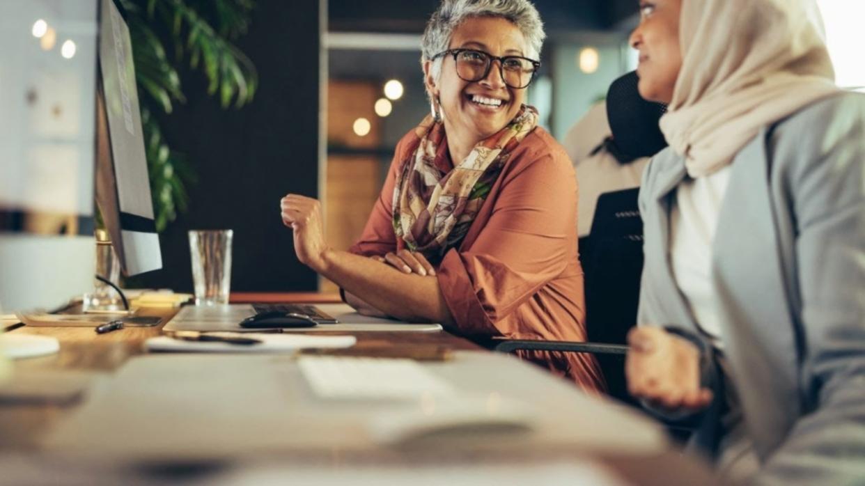 Professional workspace showing budget monitoring materials and financial documentation in organized arrangement